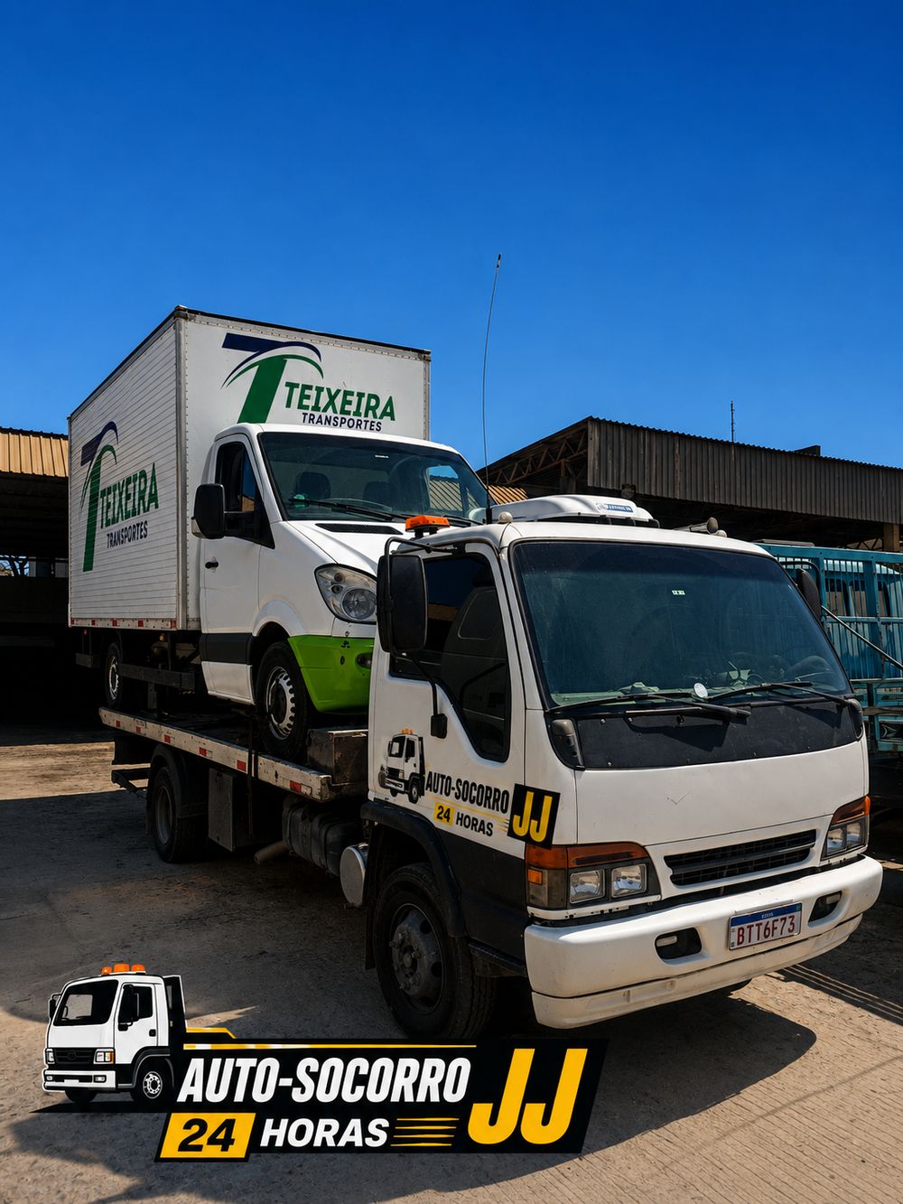 Caminhão baú sendo transportado pelo guincho